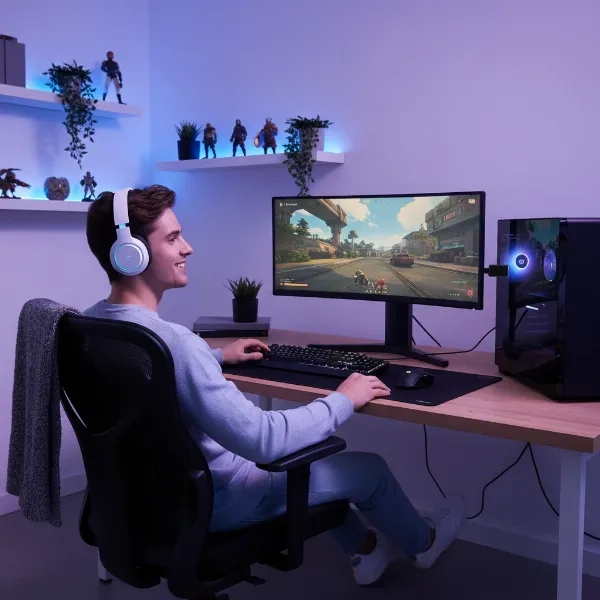 A gamer wearing a 2.4GHz wireless gaming headset, enjoying freedom of movement.